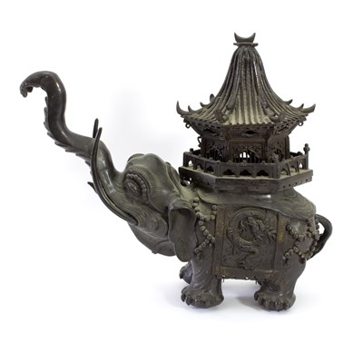 Lot 247 - A Chinese bronze model of an elephant carrying...