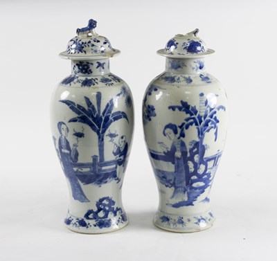 Lot 254 - A pair of 19th Century blue and white vases,...