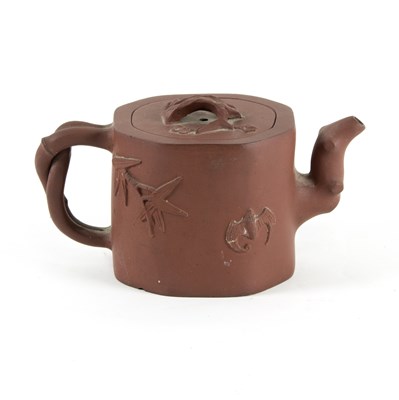 Lot 262 - A Chinese yixing clay teapot with naturalistic...