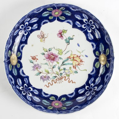 Lot 294 - A Chinese saucer dish, circa 1800, enamelled...