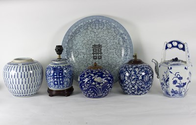 Lot 303 - A 20th Century Chinese blue and white charger,...