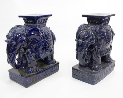 Lot 308 - A near pair of Chinese garden seats modelled...