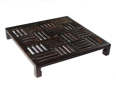 Lot 310 - A Chinese hardwood low table of lattice work...