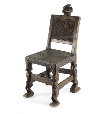 Lot 336 - A Chokwe Angolan chair, the carved wooden...