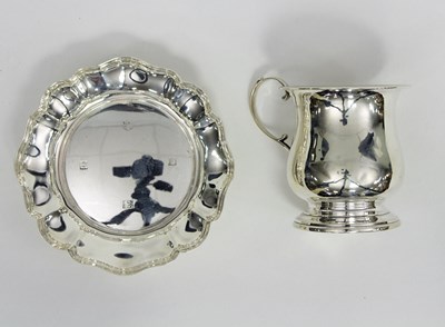 Lot 366 - A silver ogee shaped mug, Birmingham 1926, and...