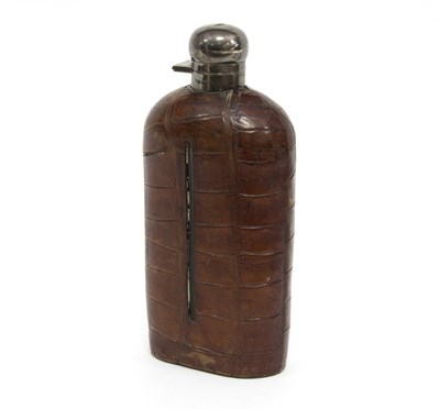 Lot 375 - A large leather covered flask with silver...