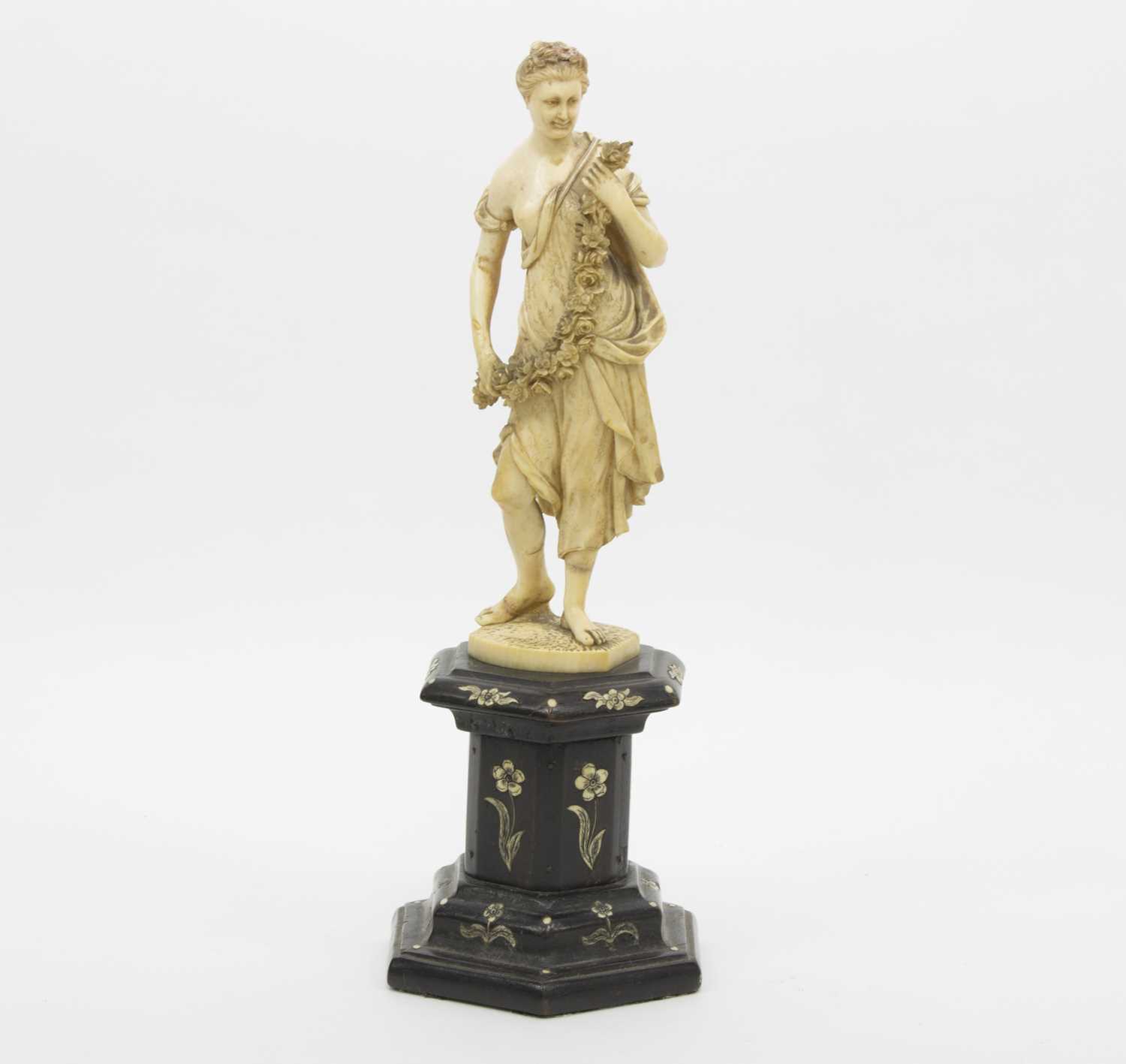 Lot 416 - A 19th Century Continental ivory figure of a