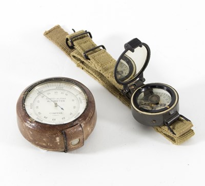 Lot 442 - A military compass with canvas strap, ref no...