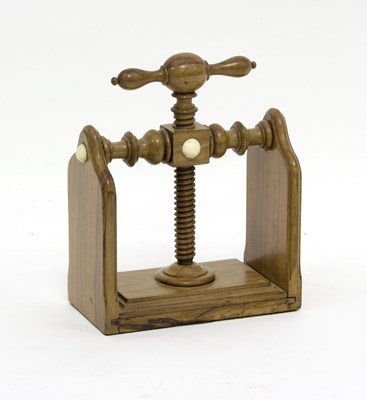 Lot 462 - A small olivewood book press, late 19th...