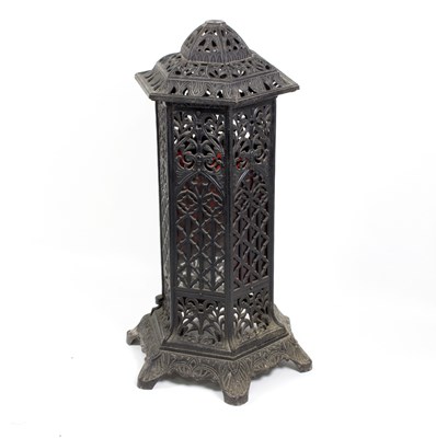 Lot 465 - A cast iron hexagonal stove with pierced...