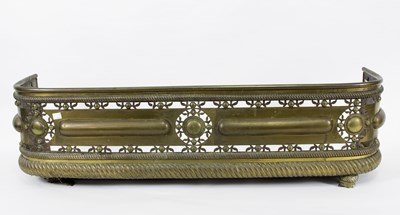 Lot 468 - A 19th Century brass fender with pierced...