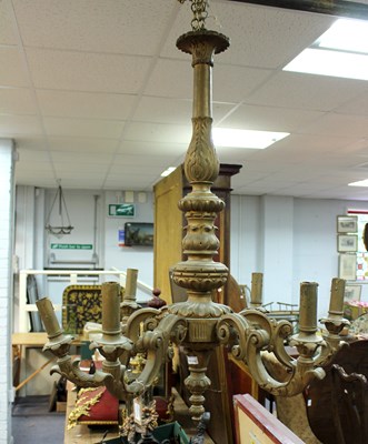 Lot 470 - A gilded six-light electrolier with scroll...