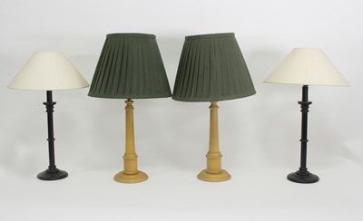 Lot 474 - A pair of turned wood table lights with shades...