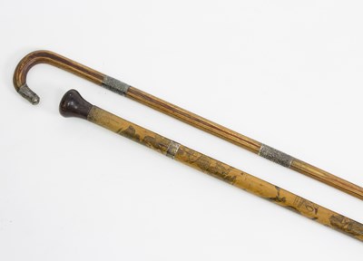 Lot 481 - A walking cane decorated Medieval knights with...