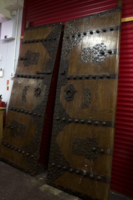 Lot 490 - A pair of Chinese wooden doors with metal...