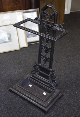 Lot 491 - A cast iron umbrella stand, the pierced back...