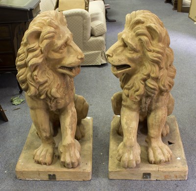 Lot 527 - A large pair of terracotta lions, each...