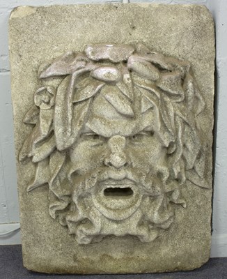 Lot 528 - A carved stone Green Man fountain head, 100cm...