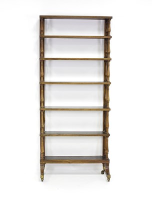 Lot 531 - A Regency style rosewood bookcase, the seven...