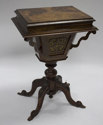 Lot 546 - A Victorian walnut work table with hinged...