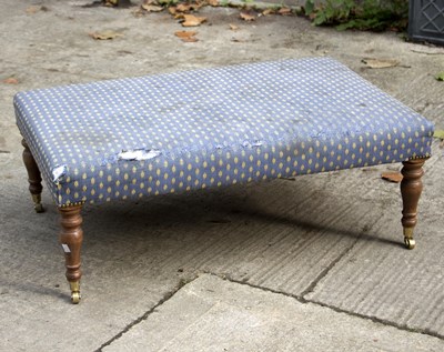 Lot 552 - An upholstered stool, on turned legs with...