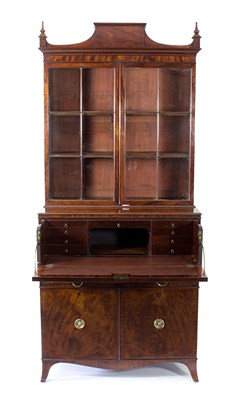 Lot 558 - A George III mahogany and inlaid secretaire...