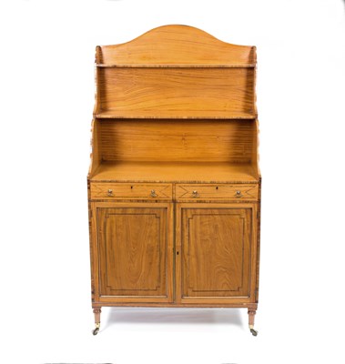 Lot 560 - An early 19th Century satinwood chiffonier,...