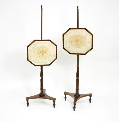 Lot 565 - A pair of early 19th Century mahogany pole...