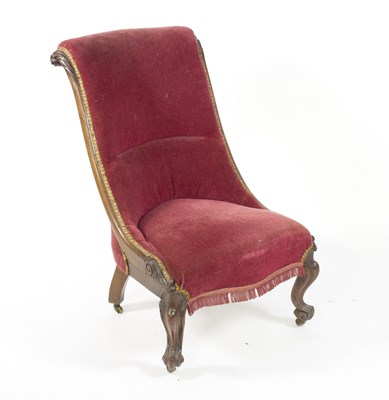 Lot 568 - A Victorian nursing chair with scroll back, on...