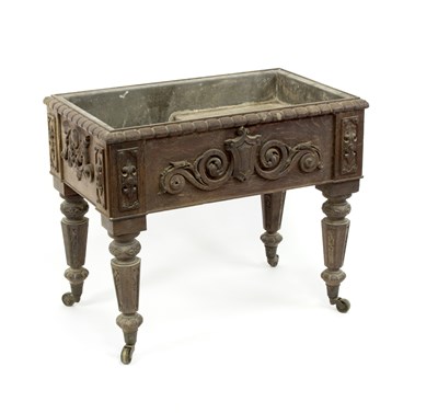 Lot 581 - A Victorian carved oak wine cooler, the...