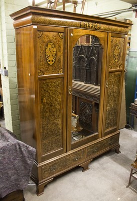 Lot 595 - A mahogany wardrobe, label for Henry Barker...