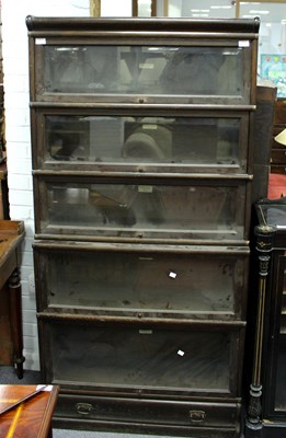 Lot 599 - A Globe Wernicke bookcase of five glazed...