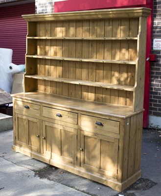 Lot 602 - A Victorian pine dresser of three shelves...