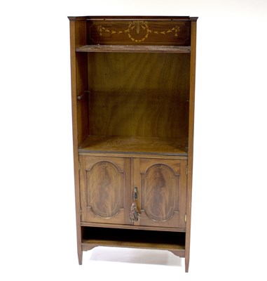 Lot 604 - An Edwardian mahogany inlaid bookcase with...