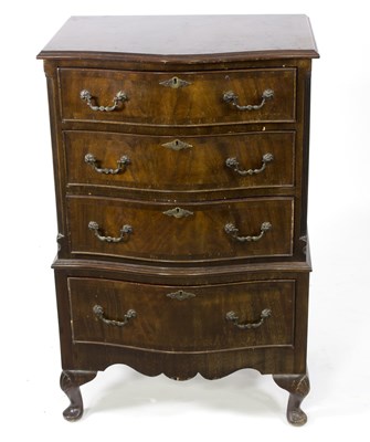 Lot 605 - A mahogany serpentine front chest on cabriole...