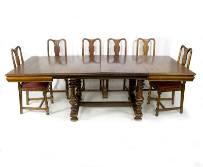 Lot 607 - A mahogany table and six chairs