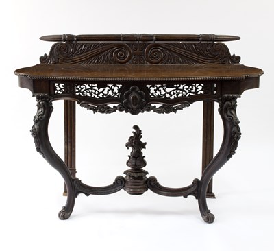 Lot 617 - A late 19th Century rosewood serpentine front...