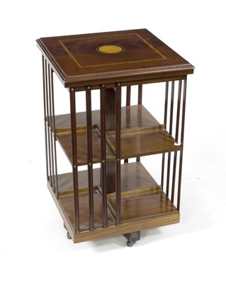 Lot 622 - An Edwardian mahogany revolving bookcase with...