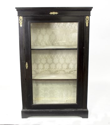 Lot 624 - An ebonised gilt metal mounted cabinet, 92cm wide