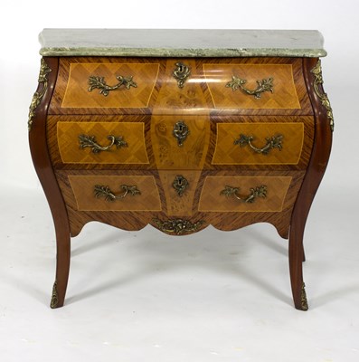 Lot 625 - A bombe© front commode with marble top and...