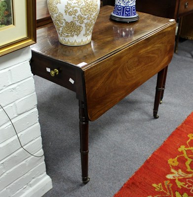 Lot 635 - A George III mahogany tea table with folding...