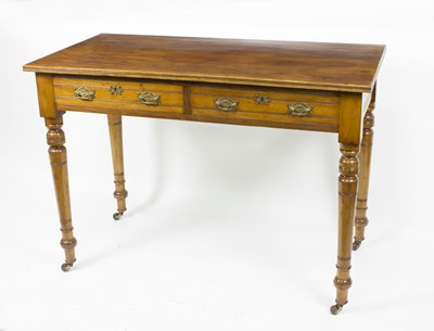 Lot 636 - An Edwardian walnut two-drawer table, 107cm wide