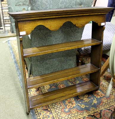 Lot 638 - A set of elm hanging shelves