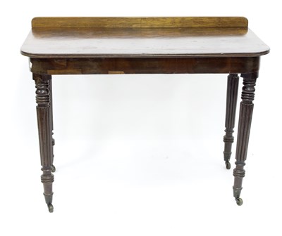 Lot 642 - A William IV mahogany side table on turned...