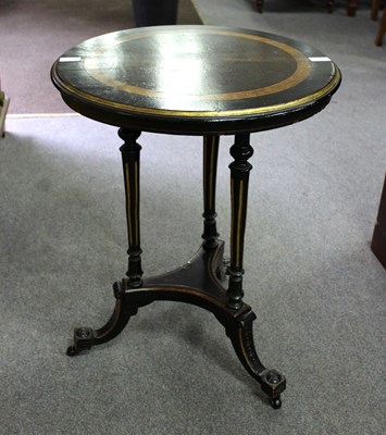 Lot 646 - A late 19th Century ebonised and parcel gilt...