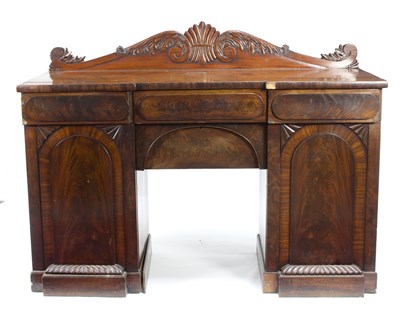 Lot 648 - A Regency mahogany pedestal sideboard with...