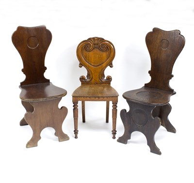 Lot 672 - A mahogany hall chair with silhouette back and...