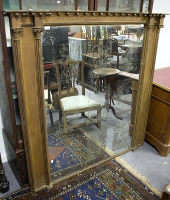 Lot 677 - A Regency overmantel mirror with breakfront...