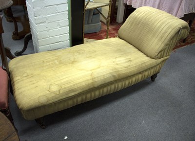 Lot 680 - A Victorian scroll end day bed on turned legs,...