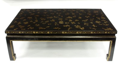 Lot 701 - A Chinese black and gold lacquer table painted...